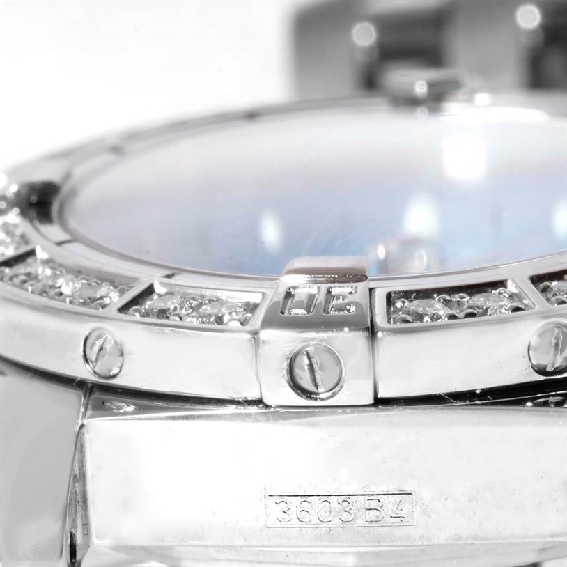 This close-up image of the Breitling A72345 Women
s Stainless Steel Mother of Pearl Dial A72345 Women
s Stainless Steel Mother of Pearl Dial Callisto Ladies Blue Mother of Pearl Diamond Watch A72345 model shows the bezel and part of the case.