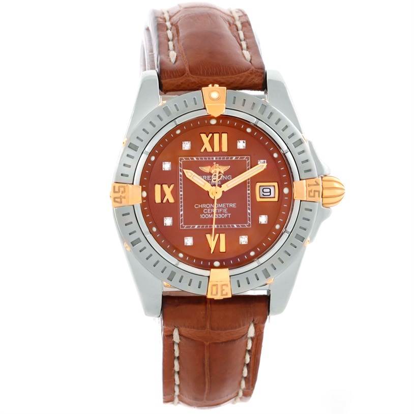 The Breitling B71356 Women
s Steel and Gold (two tone) Brown Dial B71356 Women
s Steel and Gold (two tone) Brown Dial Cockpit Ladies Steel 18K Yellow Gold Diamond Watch B71356 is shown from a front angle, highlighting its dial, bezel, and strap.