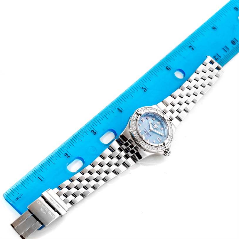 The image shows a Breitling A71340 Women's Stainless Steel Mother of Pearl Dial A71340 Women's Stainless Steel Mother of Pearl Dial Starliner Ladies Blue Mother of Pearl Diamond Watch A71340 model, displayed flat next to a ruler for size reference.