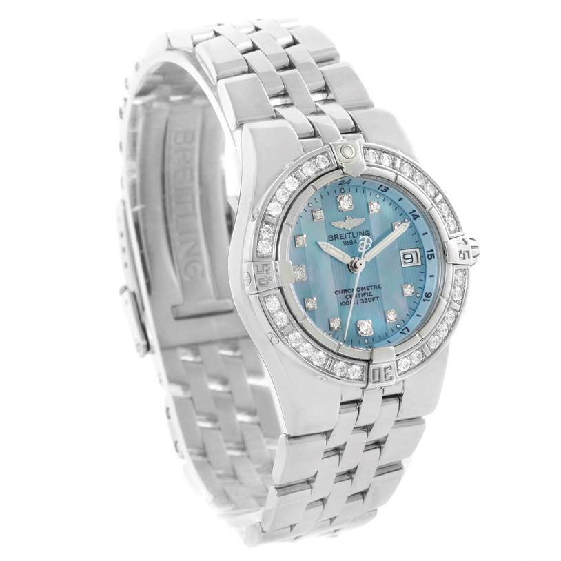 The image shows a Breitling A71340 Women's Stainless Steel Mother of Pearl Dial A71340 Women's Stainless Steel Mother of Pearl Dial Starliner Ladies A71340 watch from an angled top view, highlighting its blue mother of pearl dial and diamond bezel.
