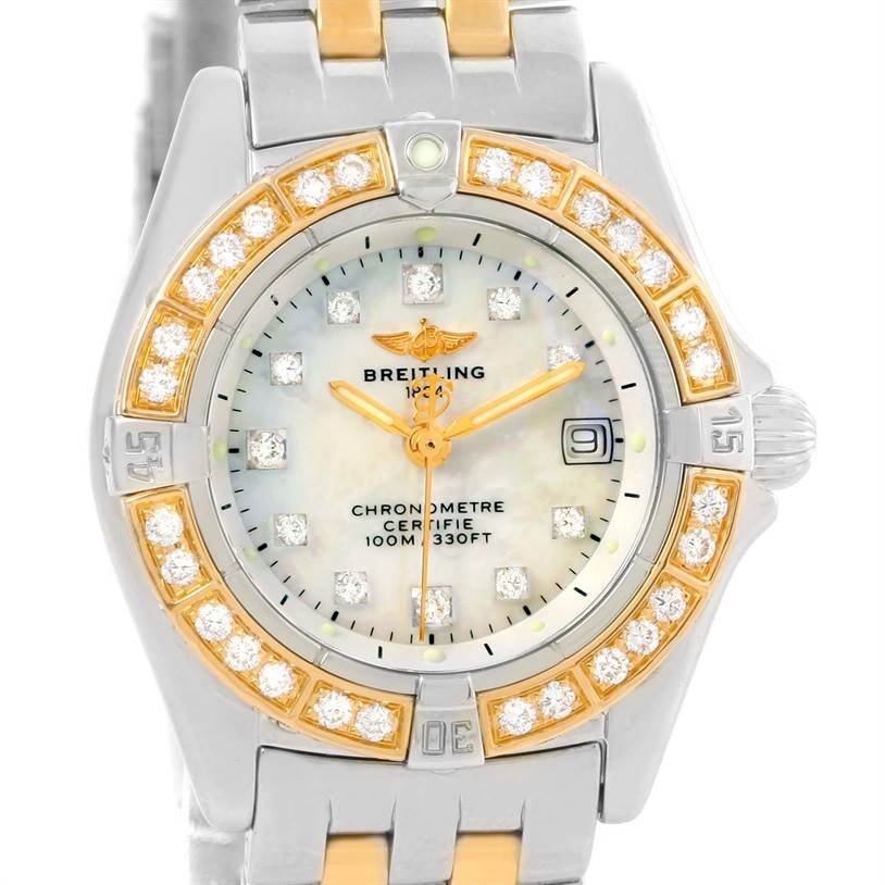 The image shows a frontal view of the Breitling D72345 Women's Stainless Steel Mother of Pearl Dial D72345 Women's Stainless Steel Mother of Pearl Dial Windrider Calisto Steel 18K Yellow Gold Diamond Watch D72345, highlighting the face, bezel, and part of the band.
