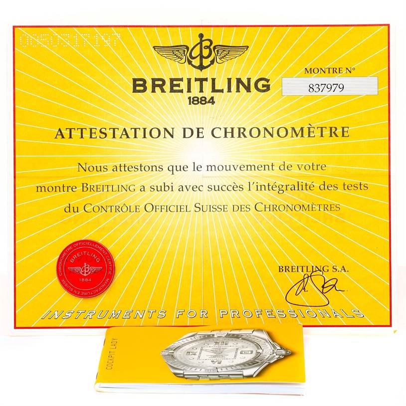 The image shows a Breitling QUARTZ MOVEMENT Women's Stainless Steel Champagne Dial QUARTZ MOVEMENT Women's Stainless Steel Champagne Dial Cockpit Ladies Steel Yellow Gold Diamond Watch model D71356 certificate and a warranty booklet.