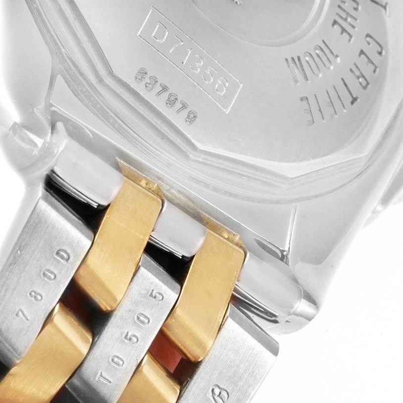 The image shows the back case and part of the bracelet of the Breitling QUARTZ MOVEMENT Women's Stainless Steel Champagne Dial QUARTZ MOVEMENT Women's Stainless Steel Champagne Dial Cockpit Ladies Steel Yellow Gold Diamond Watch D71356 model.