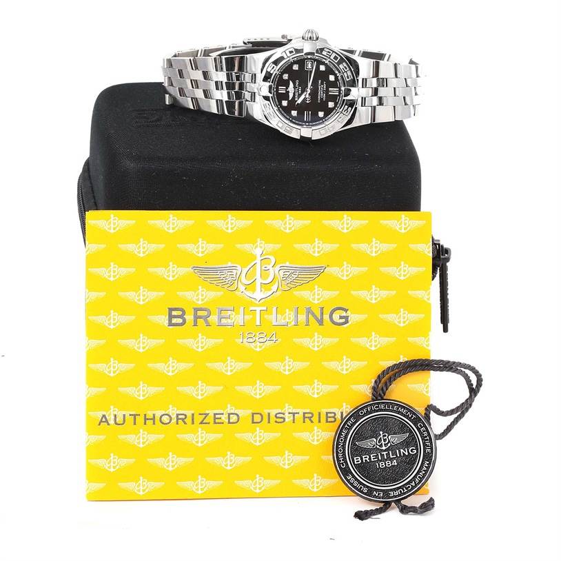 The Breitling A71340 Women's Stainless Steel Black Dial A71340 Women's Stainless Steel Black Dial Starliner Black Diamond Dial Ladies Watch A71340 is displayed from the front, showing its face, bracelet, box, and tags.