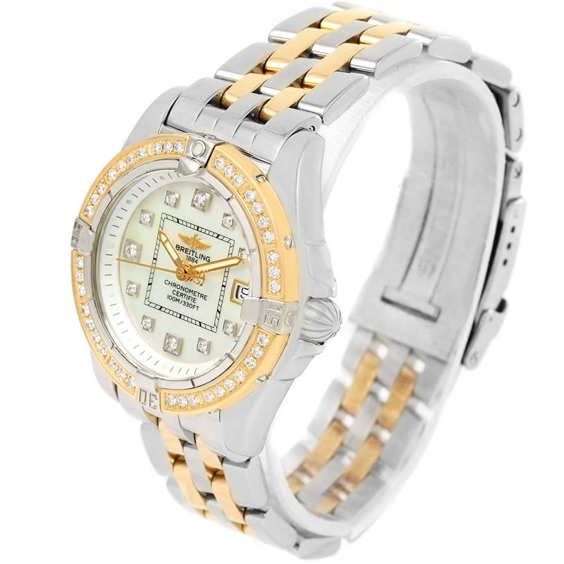 The Breitling D71356 Women's Stainless Steel Mother of Pearl Dial D71356 Women's Stainless Steel Mother of Pearl Dial Cockpit Ladies Steel 18K Yellow Gold Diamond Watch D71356 is shown at an angle, highlighting its dial, bezel, and bracelet.