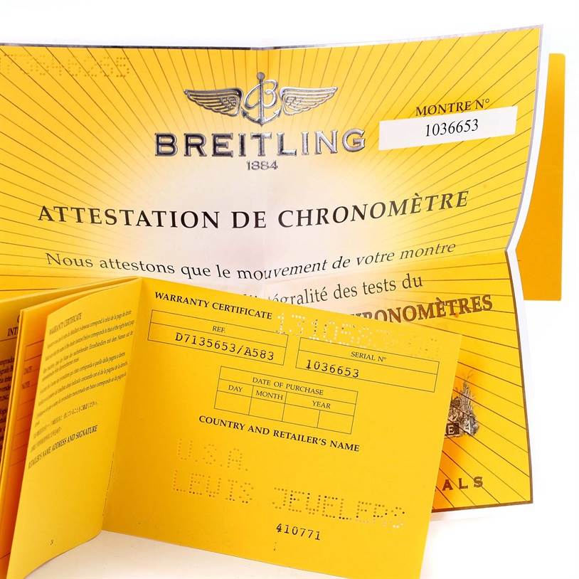 The image shows warranty certificates and documentation for the Breitling D71356 Women's Stainless Steel Mother of Pearl Dial D71356 Women's Stainless Steel Mother of Pearl Dial Cockpit Ladies Steel 18K Yellow Gold Diamond Watch D71356 model.