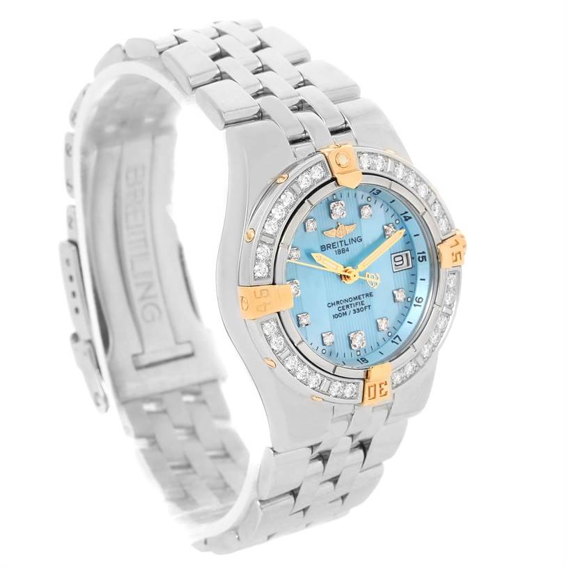 The Breitling WATCH Women's Steel and Gold (two tone) Mother of Pearl Dial WATCH Women's Steel and Gold (two tone) Mother of Pearl Dial Starliner Steel Yellow Gold Blue MOP Diamond Watch B71340 is shown at an angle highlighting its dial, bezel, and bracelet.