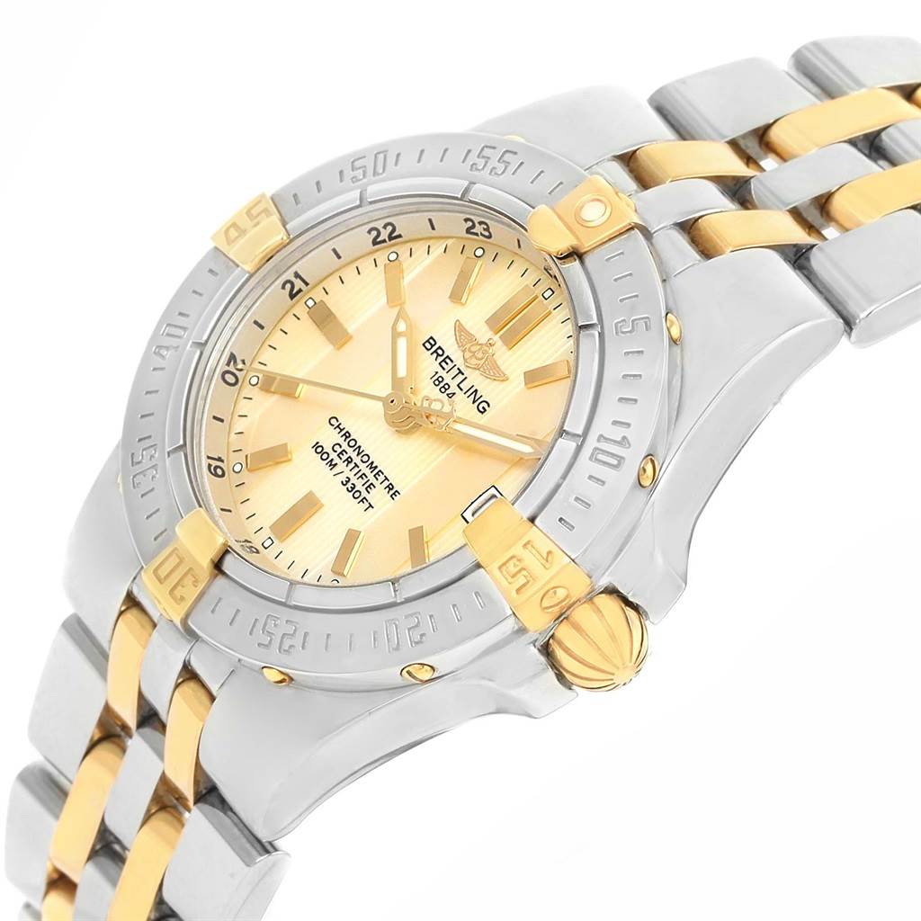 The Breitling B71340 Women's Steel and Gold (two tone) Mother of Pearl Dial B71340 Women's Steel and Gold (two tone) Mother of Pearl Dial Starliner Steel 18K Yellow Gold MOP Dial Ladies Watch B71340 is shown at a slight angle, displaying its face and part of the bracelet.