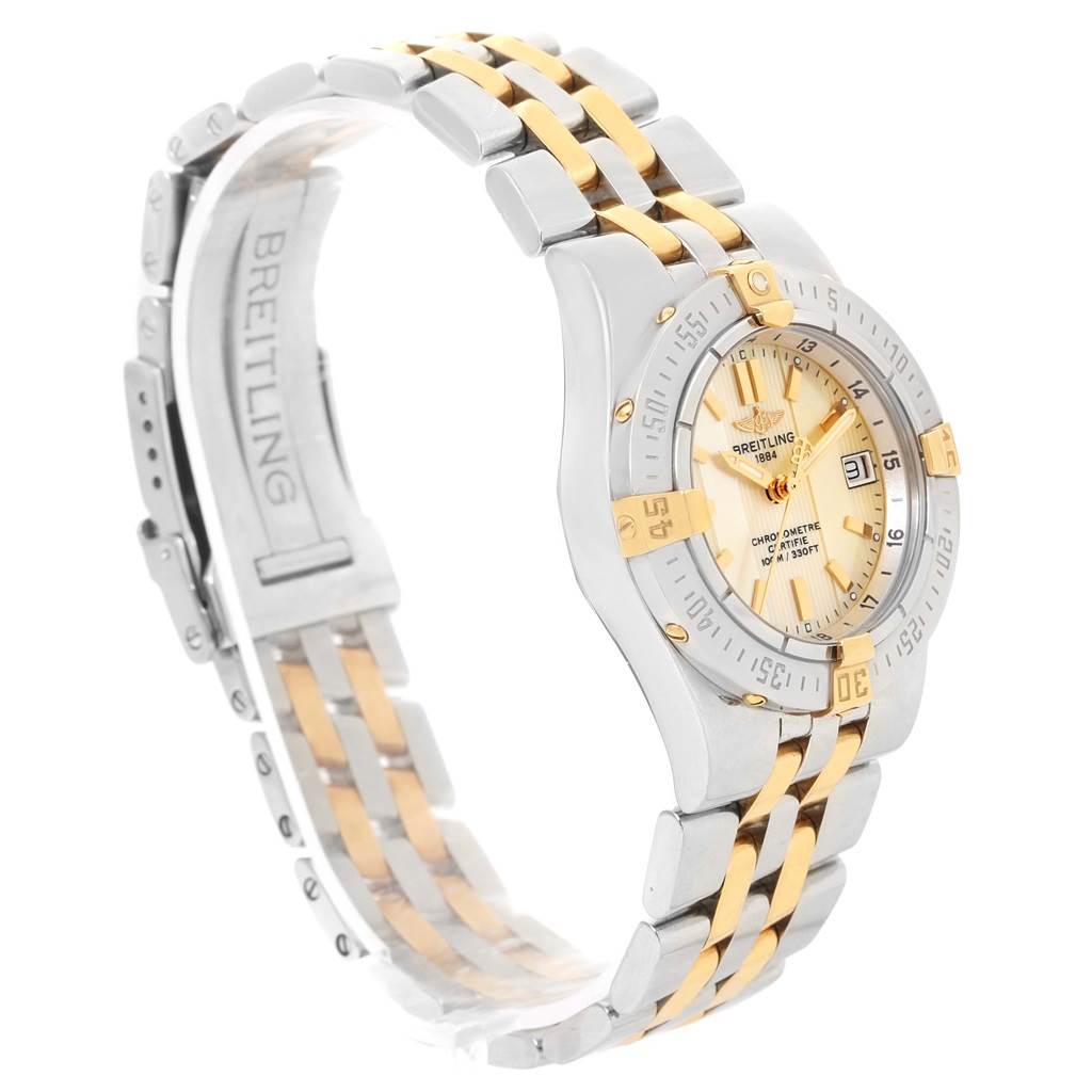 The image shows a side angle of the Breitling B71340 Women's Steel and Gold (two tone) Mother of Pearl Dial B71340 Women's Steel and Gold (two tone) Mother of Pearl Dial Starliner Steel 18K Yellow Gold MOP Dial Ladies Watch B71340, highlighting its dial, bezel, and bracelet.