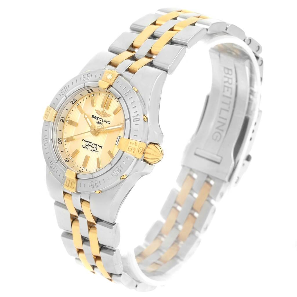 This Breitling B71340 Women's Steel and Gold (two tone) Mother of Pearl Dial B71340 Women's Steel and Gold (two tone) Mother of Pearl Dial Starliner Steel 18K Yellow Gold MOP Dial Ladies Watch B71340 is shown at a slight angle, displaying the dial, bezel, and bracelet.