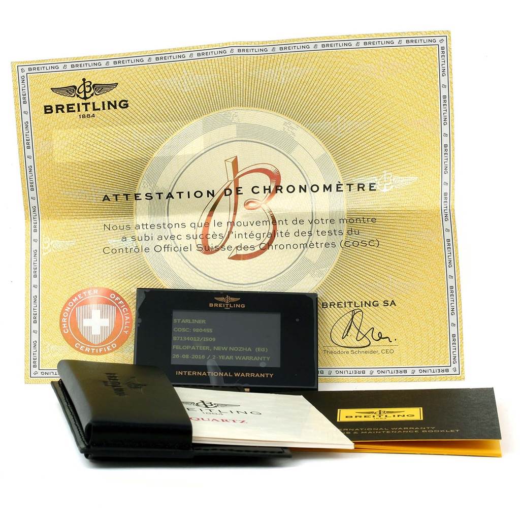 The image shows warranty and certification papers for the Breitling B71340 Women's Steel and Gold (two tone) Mother of Pearl Dial B71340 Women's Steel and Gold (two tone) Mother of Pearl Dial Starliner Steel 18K Yellow Gold MOP Dial Ladies Watch B71340.