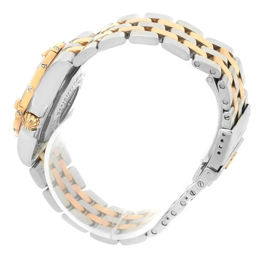 The image shows the side view of the Breitling C71340 Women's Steel and Gold (two tone) Mother of Pearl Dial C71340 Women's Steel and Gold (two tone) Mother of Pearl Dial Galactic 30 Ladies Steel 18K Rose Gold Diamond Watch C71340, highlighting the band and crown.