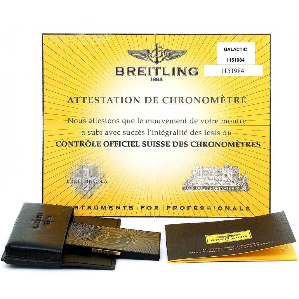 The image shows the certification and accessories for the Breitling C71340 Women's Steel and Gold (two tone) Mother of Pearl Dial C71340 Women's Steel and Gold (two tone) Mother of Pearl Dial Galactic 30 Ladies Steel 18K Rose Gold Diamond Watch C71340 model.