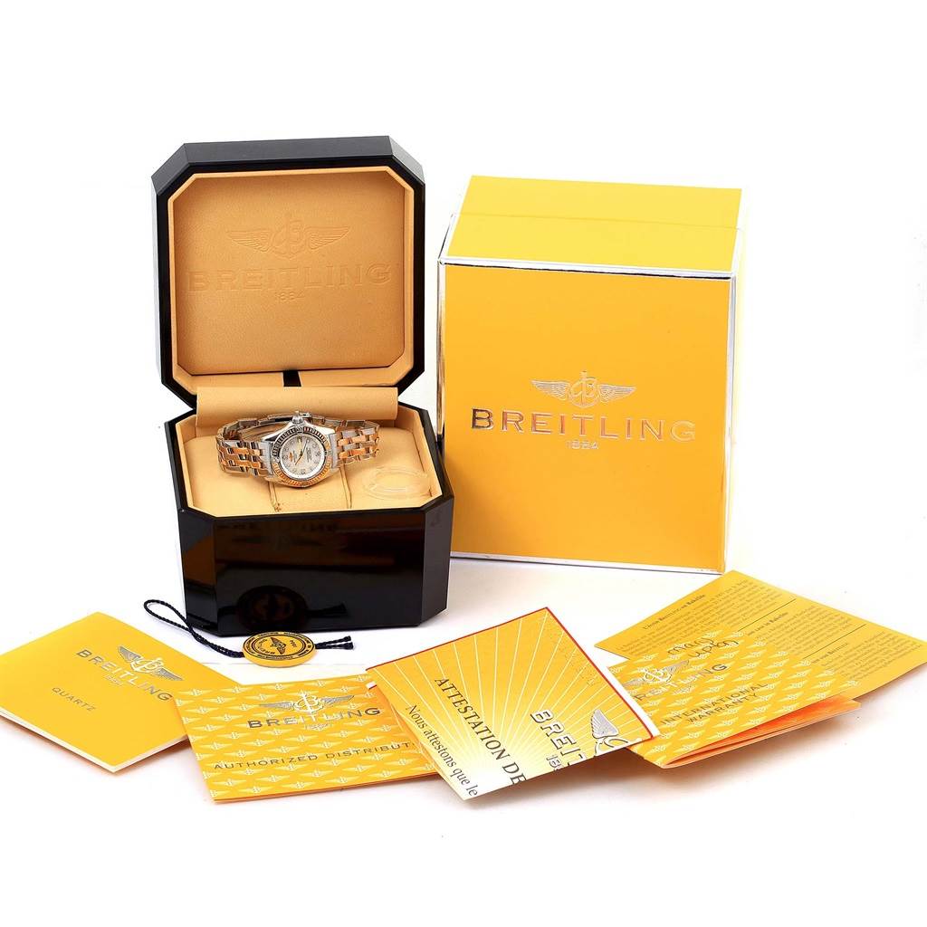 The Breitling D72345 Women's Stainless Steel Mother of Pearl Dial D72345 Women's Stainless Steel Mother of Pearl Dial Windrider Calisto Steel Yellow Gold Diamond Ladies Watch D72345 is shown in its box with accessories and documentation.