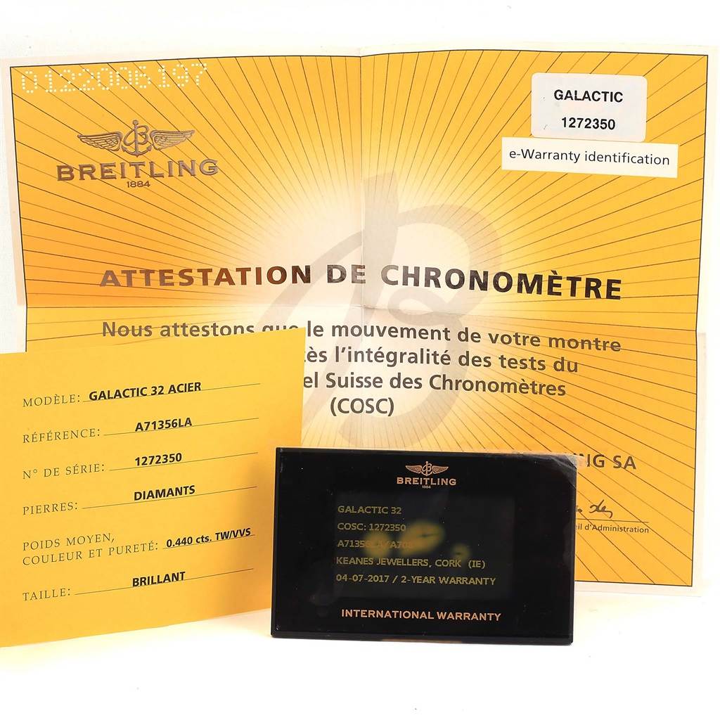 The image shows documentation and warranty cards for the Breitling A71356 Women's Stainless Steel Mother of Pearl Dial A71356 Women's Stainless Steel Mother of Pearl Dial Cockpit Mother Pearl Diamond Women's Watch A71356.