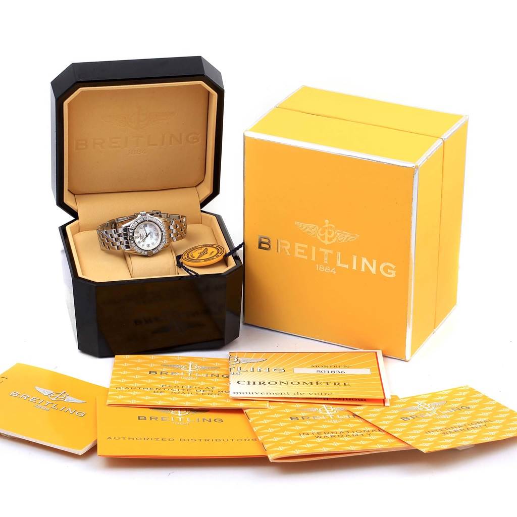 The Breitling A72345 Women's Stainless Steel Mother of Pearl Dial A72345 Women's Stainless Steel Mother of Pearl Dial Callisto MOP Diamond Ladies Watch A72345 is shown in an open box with additional papers and packaging.