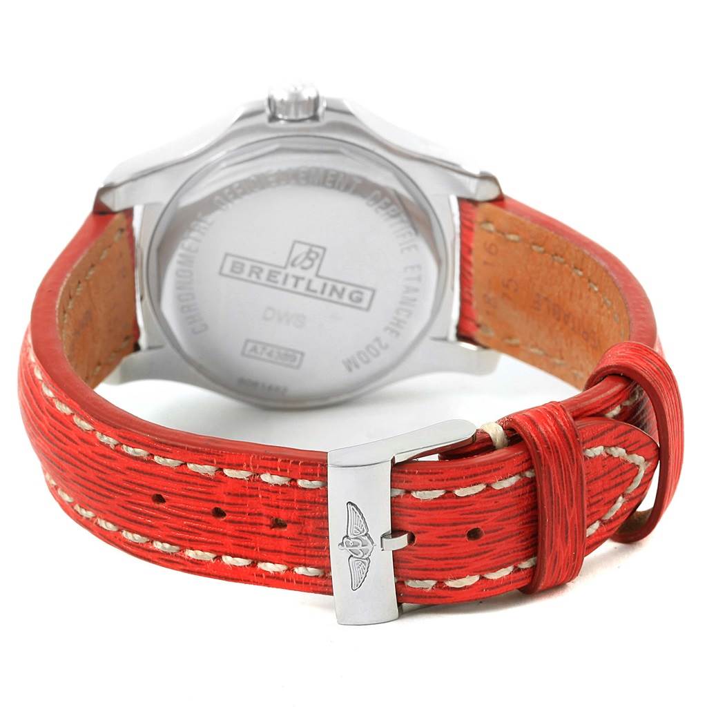 The image shows a rear view of the Breitling A74389 Women's Stainless Steel Black Dial A74389 Women's Stainless Steel Black Dial Colt 36 Quartz Steel Men's Watch A74389, highlighting its case back and red strap.