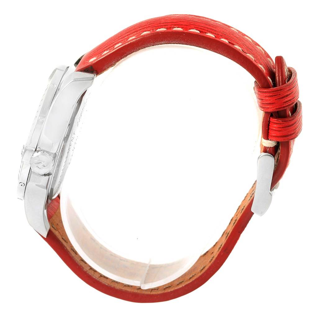 The image shows a side view of the Breitling A74389 Women's Stainless Steel Black Dial A74389 Women's Stainless Steel Black Dial Colt 36 Quartz Steel Mens Watch A74389 with a red leather strap and buckle.