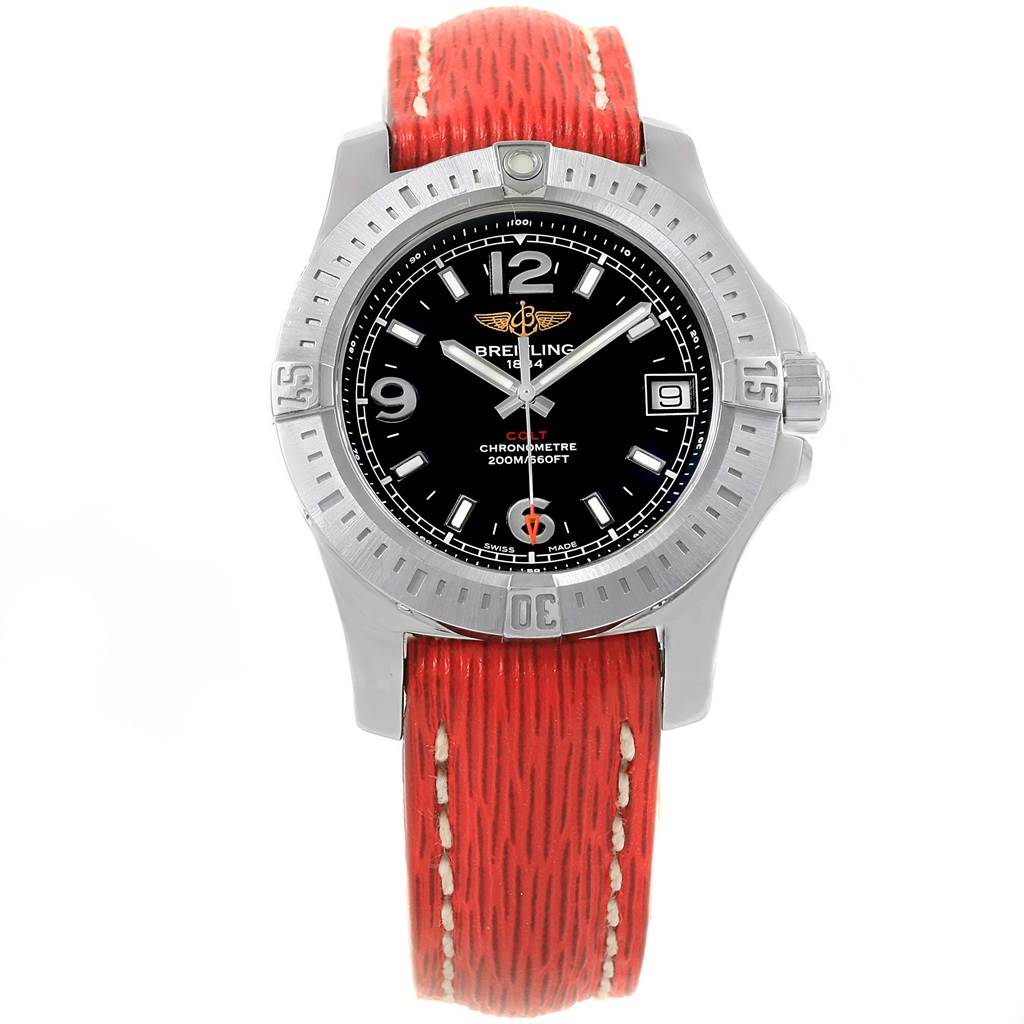 The image shows a frontal view of the Breitling A74389 Women's Stainless Steel Black Dial A74389 Women's Stainless Steel Black Dial Colt 36 Quartz Steel Mens Watch A74389 with a red leather strap.