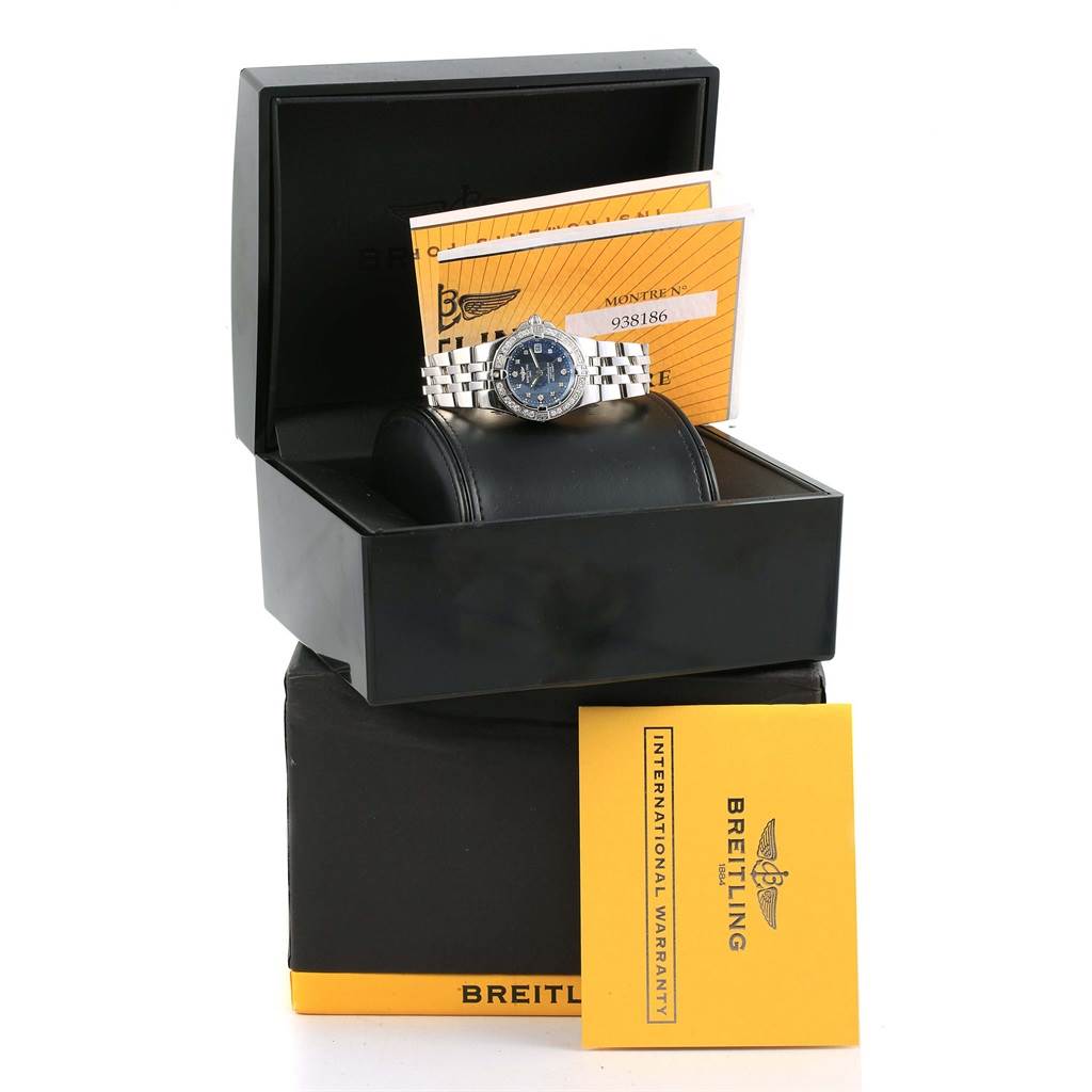 The Breitling A71340 Women's Stainless Steel Mother of Pearl Dial A71340 Women's Stainless Steel Mother of Pearl Dial Starliner Blue MOP Diamond Ladies Watch A71340 is shown in its box with warranty papers and manuals.