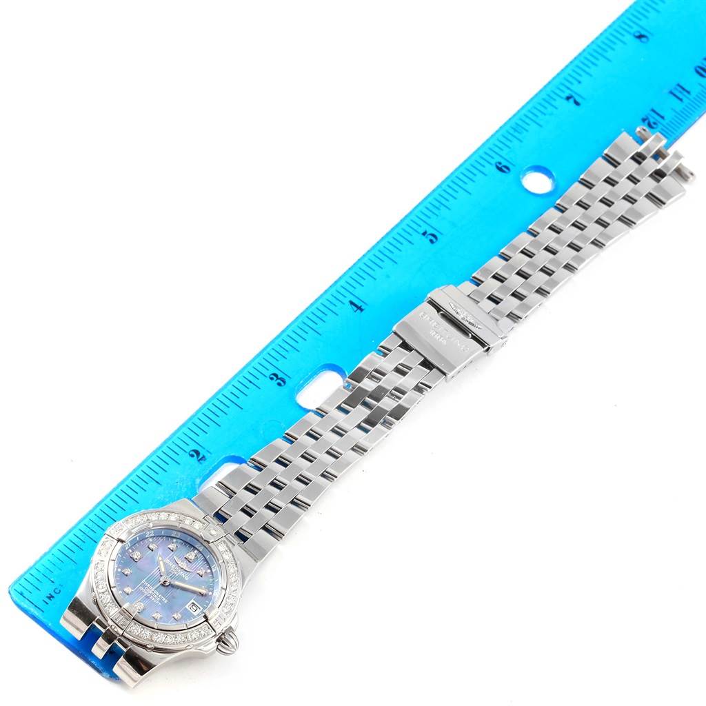 The Breitling A71340 Women's Stainless Steel Mother of Pearl Dial A71340 Women's Stainless Steel Mother of Pearl Dial Starliner Blue MOP Diamonds Ladies Watch A71340 is shown at a slight angle with the face, bracelet, and clasp visible.