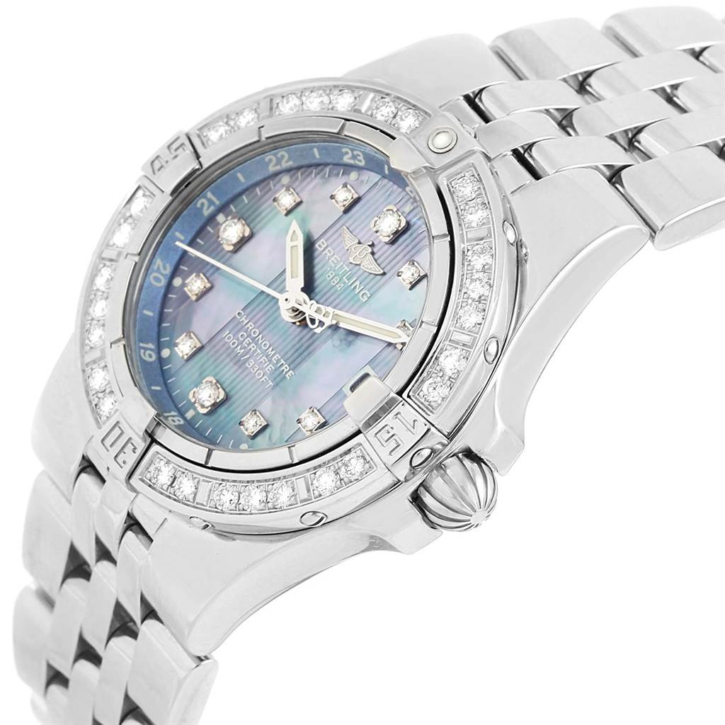 The image shows a side-angle view of the Breitling A71340 Women's Stainless Steel Mother of Pearl Dial A71340 Women's Stainless Steel Mother of Pearl Dial Starliner Blue MOP Diamonds Ladies Watch A71340, highlighting the watch face, bezel, and bracelet.
