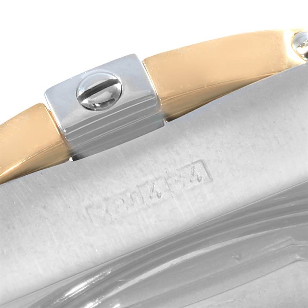 This image shows a close-up of the band and screw on the Breitling D71356 Women's Stainless Steel Mother of Pearl Dial D71356 Women's Stainless Steel Mother of Pearl Dial Cockpit Ladies Steel 18K Yellow Gold Diamond Watch D71356 model.