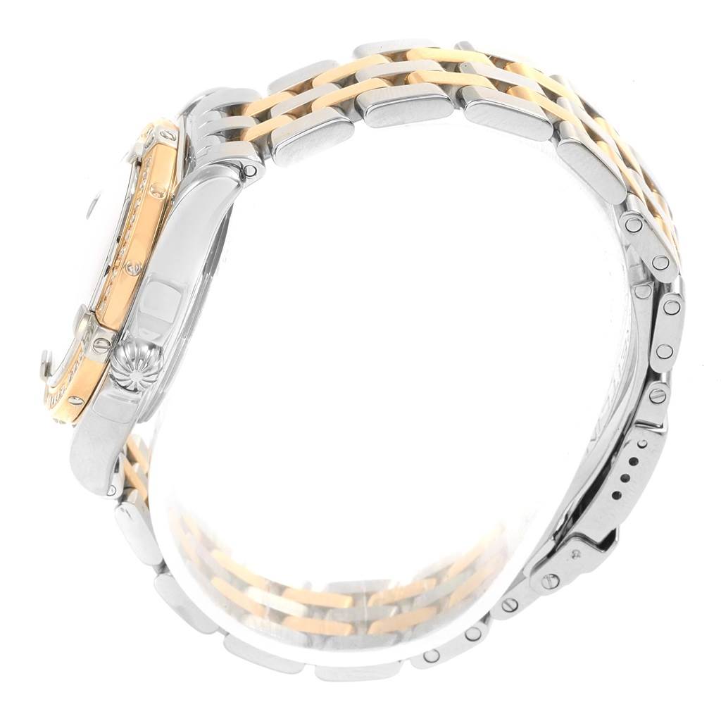 The image shows a side view of the Breitling D71356 Women's Stainless Steel Mother of Pearl Dial D71356 Women's Stainless Steel Mother of Pearl Dial Cockpit Ladies Steel 18K Yellow Gold Diamond Watch D71356, highlighting the band and case.