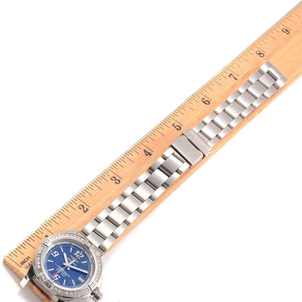 The Breitling A77388 Women's Stainless Steel Blue Dial A77388 Women's Stainless Steel Blue Dial Colt Blue Dial Diamond Bezel Steel Ladies Watch A77388 model is shown from a top view alongside a ruler measuring the bracelet.