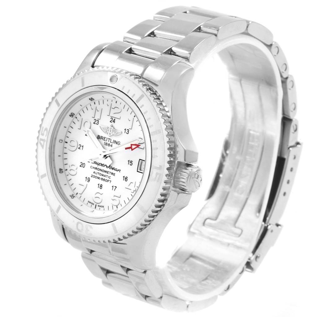 The image shows a Breitling A17312D2/A775/179A Women's Stainless Steel White Dial A17312D2/A775/179A Women's Stainless Steel White Dial Superocean II 36 Hurricane White Steel Ladies Watch A17312 from an angled side view, highlighting the face, bezel, and part of the bracelet.