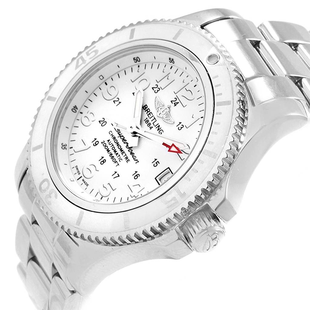 The Breitling A17312D2/A775/179A Women's Stainless Steel White Dial A17312D2/A775/179A Women's Stainless Steel White Dial Superocean II 36 A17312 is shown at an angled side view, highlighting the white dial, bezel, crown, and part of the bracelet.