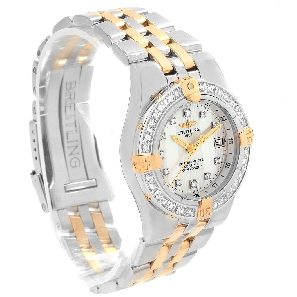 The image shows a Breitling B71340 Women's Steel and Gold (two tone) Mother of Pearl Dial B71340 Women's Steel and Gold (two tone) Mother of Pearl Dial Starliner Steel Yellow Gold MOP Diamond Ladies Watch B71340 from a slightly angled side view, highlighting the band and face.