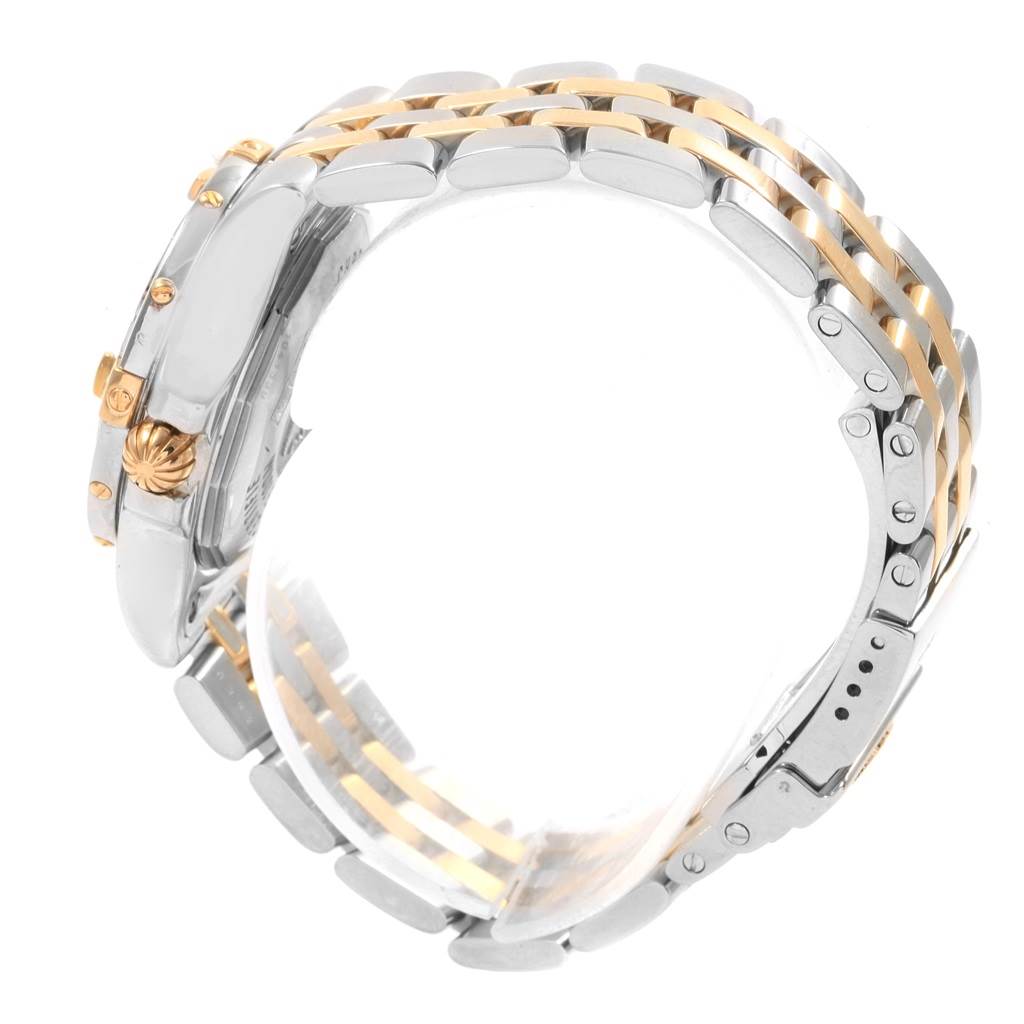 The image shows a side view of the Breitling B71340 Women's Steel and Gold (two tone) Mother of Pearl Dial B71340 Women's Steel and Gold (two tone) Mother of Pearl Dial Starliner Steel Gold Yellow MOP Diamond Ladies Watch B71340, highlighting its bracelet and crown.