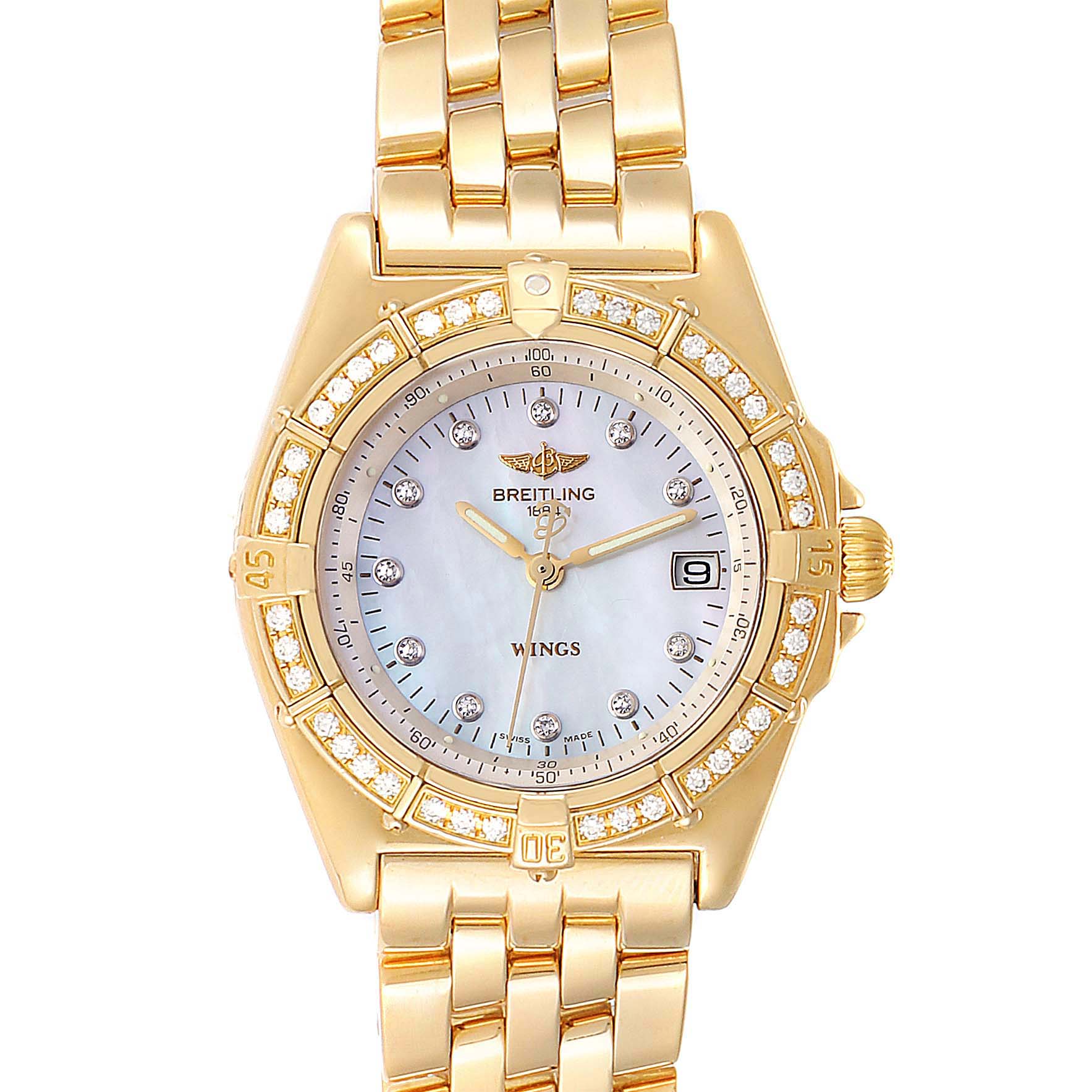 The Breitling K67050 Women's Yellow Gold Mother of Pearl Dial K67050 Women's Yellow Gold Mother of Pearl Dial Windrider Yellow Gold MOP Diamond Ladies Watch K67050 is shown from a front angle, displaying the dial, bezel, and part of the bracelet.