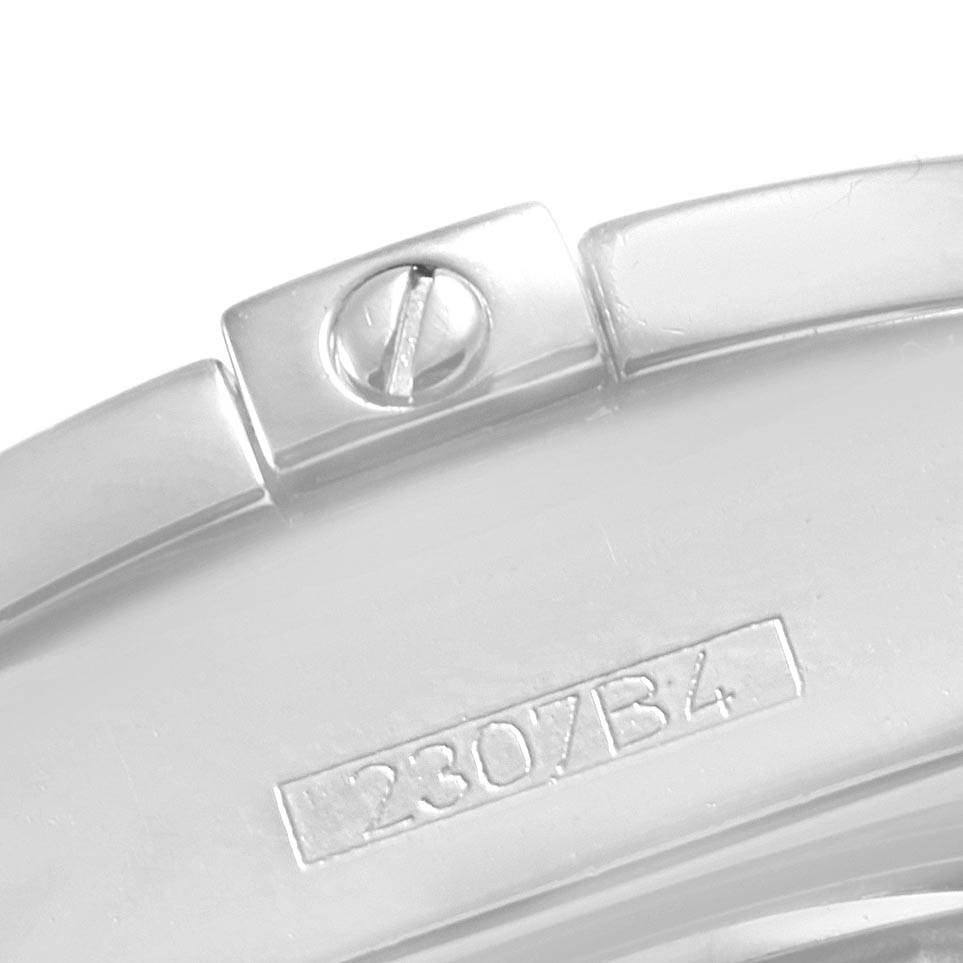 This image shows a close-up of the bezel of the Breitling A71356 Women's Stainless Steel Mother of Pearl Dial A71356 Women's Stainless Steel Mother of Pearl Dial Cockpit Mother Pearl Diamond Dial Bezel Ladies Watch A71356, displaying a screw and serial number.