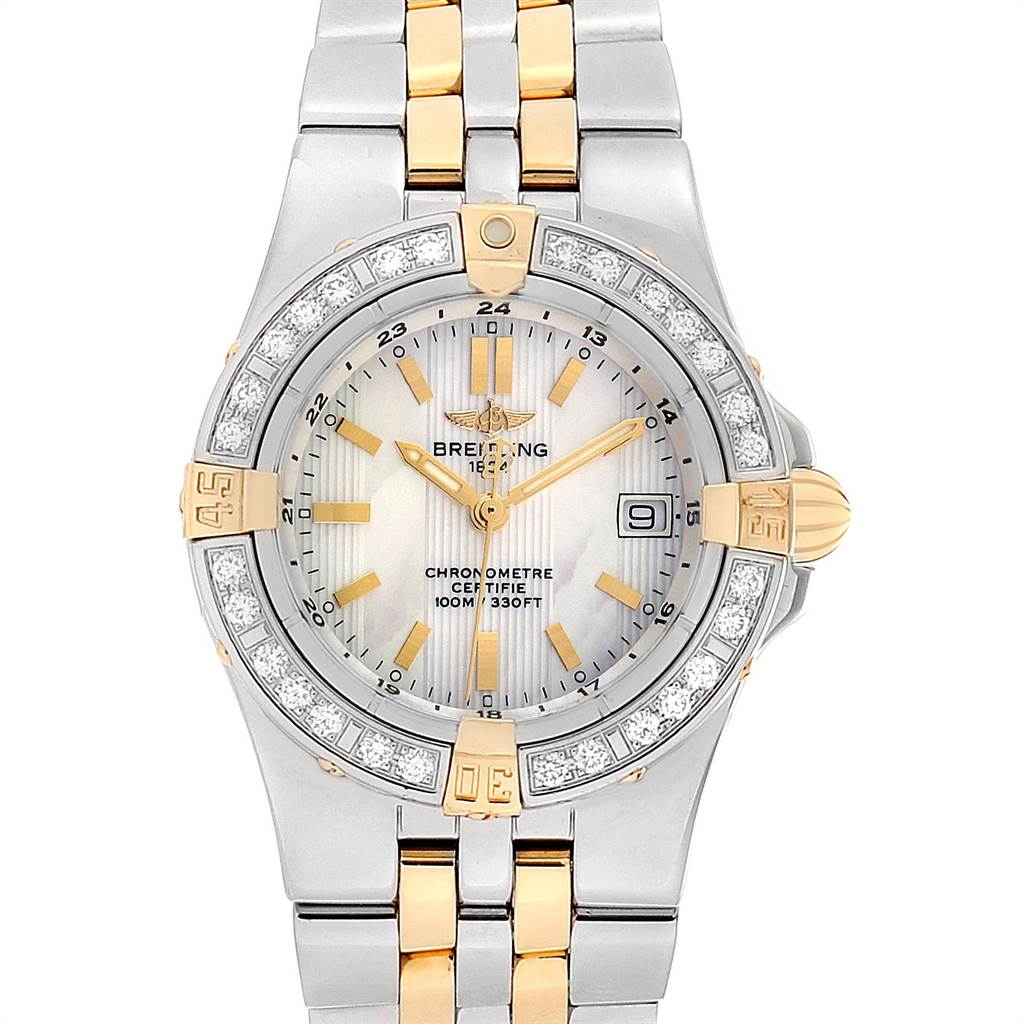 The image shows a Breitling B71340 Women's Steel and Gold (two tone) Mother of Pearl Dial B71340 Women's Steel and Gold (two tone) Mother of Pearl Dial Starliner Steel Yellow Gold MOP Diamond Ladies Watch B71340 from a top-down angle, detailing the dial, bezel, and band.