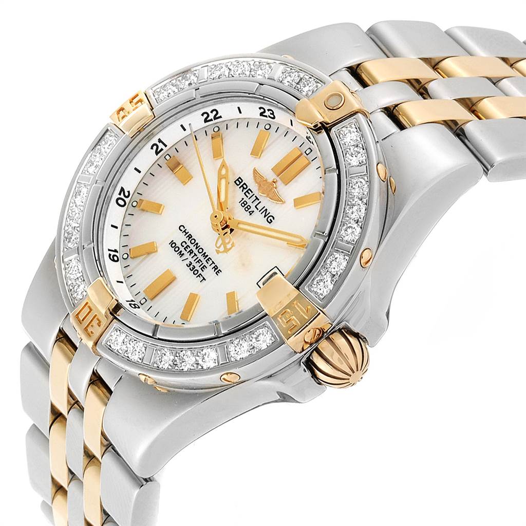 The image shows a Breitling B71340 Women's Steel and Gold (two tone) Mother of Pearl Dial B71340 Women's Steel and Gold (two tone) Mother of Pearl Dial Starliner Steel Yellow Gold MOP Diamond Ladies Watch B71340 at an angled view highlighting the face and part of the bracelet.