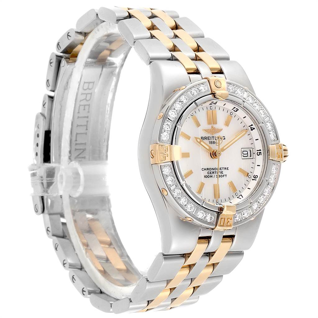 The Breitling B71340 Women's Steel and Gold (two tone) Mother of Pearl Dial B71340 Women's Steel and Gold (two tone) Mother of Pearl Dial Starliner Steel Yellow Gold MOP Diamond Ladies Watch B71340 is shown at an angle highlighting the face, bracelet, and bezel.