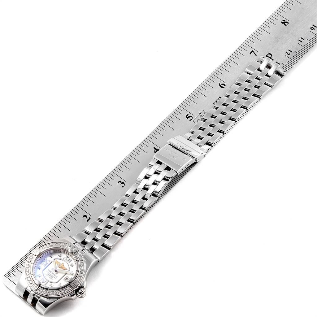 This image shows a Breitling A71340 Women's Stainless Steel Mother of Pearl Dial A71340 Women's Stainless Steel Mother of Pearl Dial Starliner 30mm Mother of Pearl Diamond Ladies Watch A71340 in a flat position, including the face and bracelet.