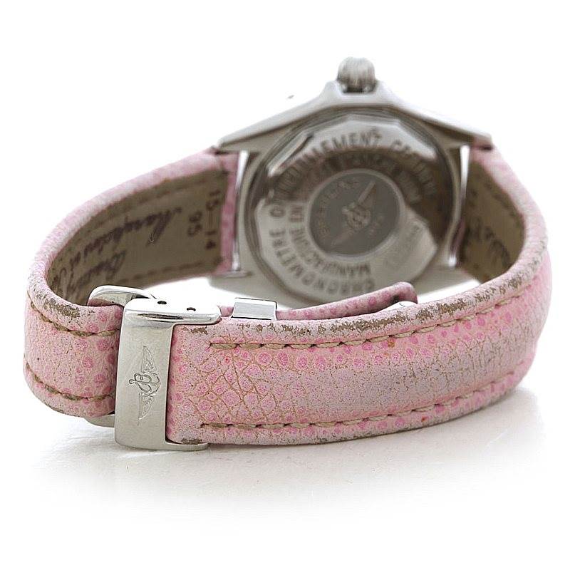 The image shows the back view of a Breitling D72345 Women's Stainless Steel Mother of Pearl Dial D72345 Women's Stainless Steel Mother of Pearl Dial Windrider Calisto Ladies Diamond Watch D72345 with a pink leather strap and clasp.