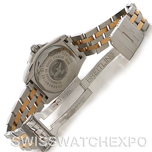 The image shows the back and clasp of a Breitling D7135612 Women
s Stainless Steel Mother of Pearl Dial D7135612 Women
s Stainless Steel Mother of Pearl Dial Cockpit Ladies Diamond Watch D7135612, highlighting the engraved details on the case back and bracelet.