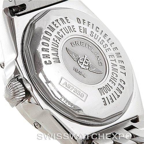 The image shows the back case and crown of a Breitling Women's Stainless Steel Mother of Pearl Dial Women's Stainless Steel Mother of Pearl Dial Windrider Wings Ladies MOP Diamond Watch model A67350.