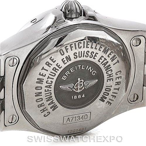 The image shows the back case of a Breitling A71340 Women's Stainless Steel White Dial A71340 Women's Stainless Steel White Dial Starliner Ladies Diamond Watch A71340 model, highlighting the engravings and serial number.