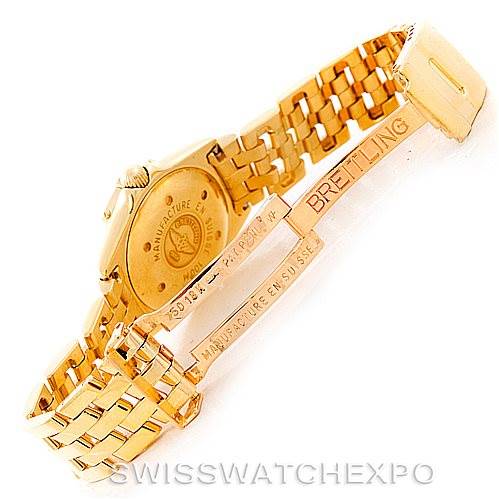 This image shows the underside and clasp of the Callistino Ladies 18K Yellow Gold Diamond Watch K52045 model by Breitling K52045 Women's Yellow Gold Mother of Pearl Dial K52045 Women's Yellow Gold Mother of Pearl Dial, highlighting the inscriptions.