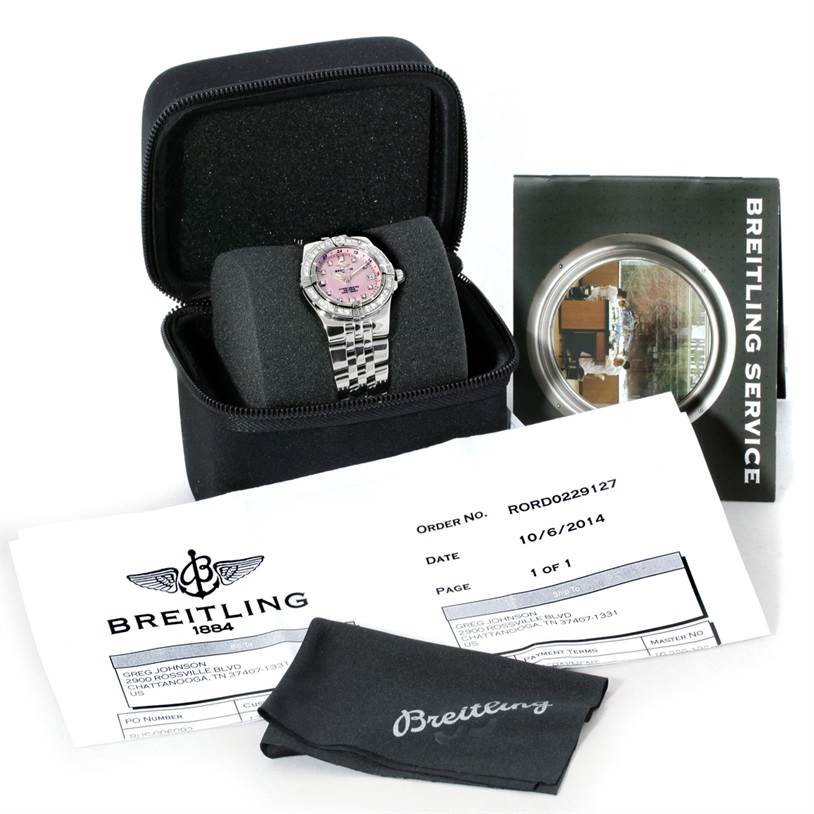 The image shows the Breitling A71340 Women's Stainless Steel Mother of Pearl Dial A71340 Women's Stainless Steel Mother of Pearl Dial Starliner Ladies Mother of Pearl Diamond Watch A71340 in its case, with service papers and a cloth.