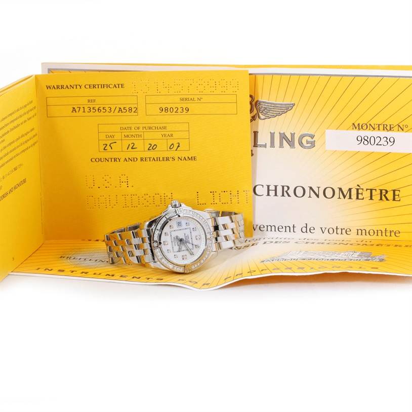 The Breitling A71356 Women's Stainless Steel Mother of Pearl Dial A71356 Women's Stainless Steel Mother of Pearl Dial Windrider Cockpit Ladies MOP Diamond Watch A71356 is displayed with its warranty certificate and box.