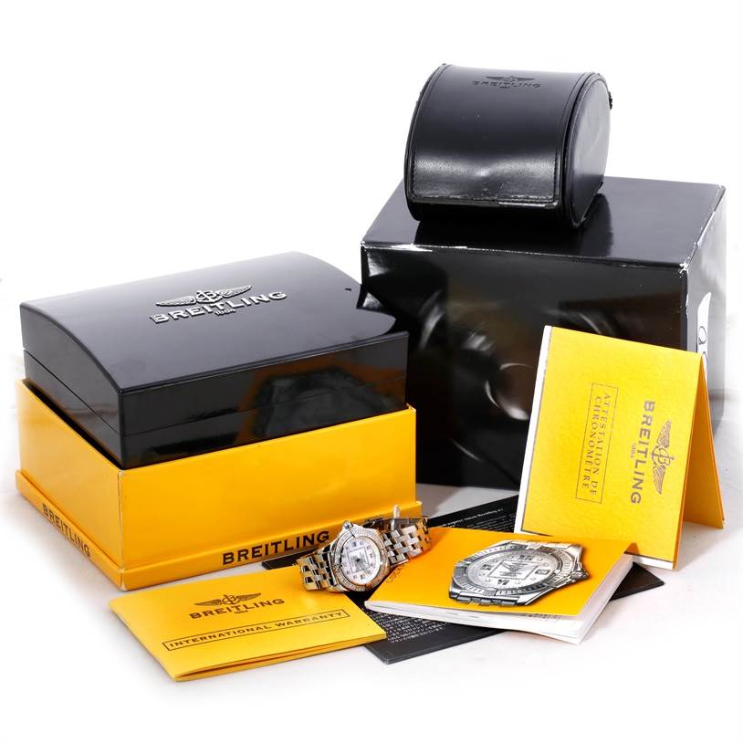 The image shows a front view of the Breitling A71356 Women's Stainless Steel Mother of Pearl Dial A71356 Women's Stainless Steel Mother of Pearl Dial Windrider Cockpit Ladies MOP Diamond Watch A71356 with its box, warranty, and papers.
