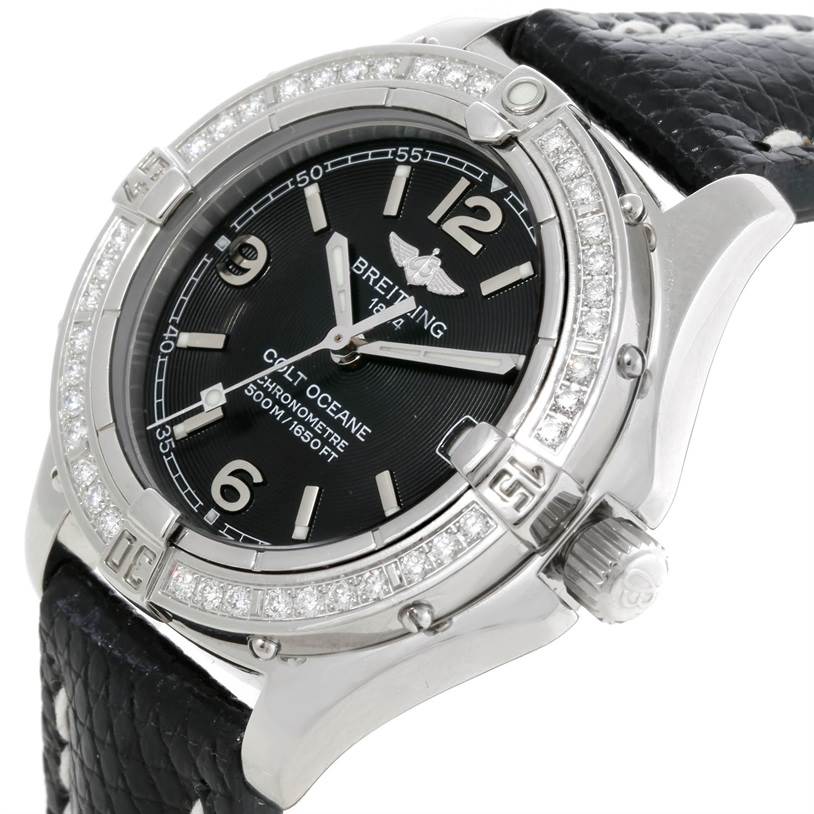 This Breitling A67350 Women
s Stainless Steel Black Dial A67350 Women
s Stainless Steel Black Dial Colt Oceane SQ Ladies Diamond Watch A77350 is shown at an angle displaying the dial, bezel, and part of the leather strap.