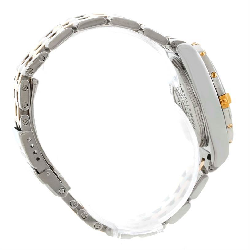 The image shows a side angle of the Breitling B71356 Women
s Steel and Gold (two tone) Black Dial B71356 Women
s Steel and Gold (two tone) Black Dial Cockpit Ladies Steel 18K Yellow Gold Diamond Watch B71356 model, highlighting the band and case.