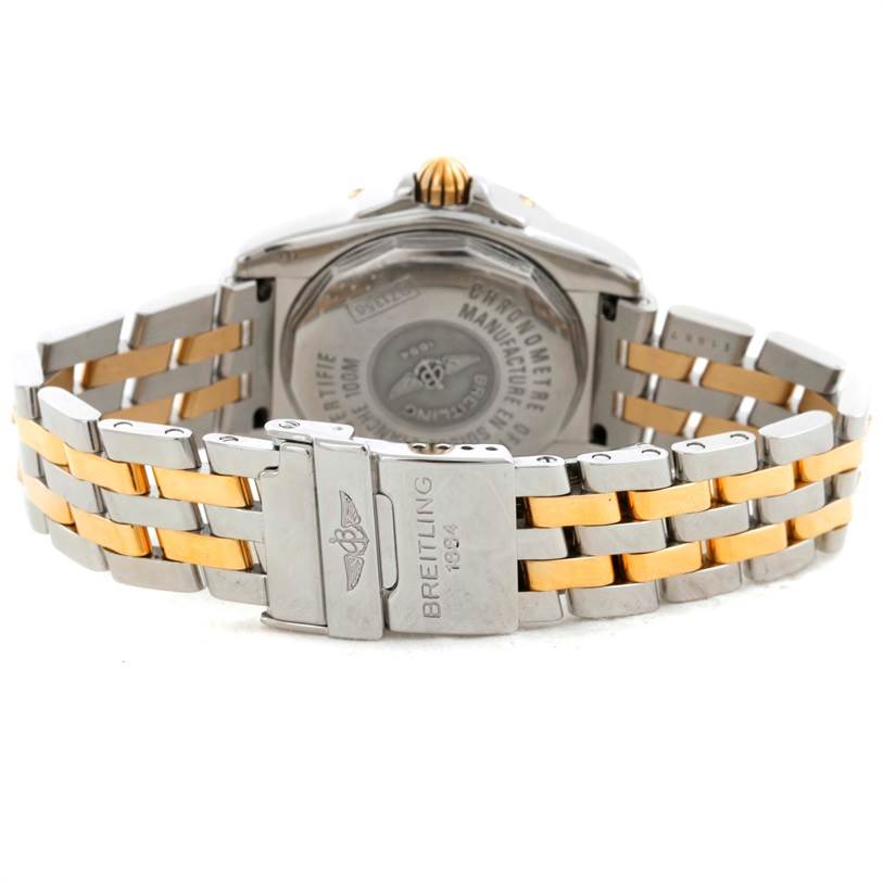 This image shows the back view of the Breitling B71356 Women
s Steel and Gold (two tone) Black Dial B71356 Women
s Steel and Gold (two tone) Black Dial Cockpit Ladies Steel 18K Yellow Gold Diamond Watch B71356, including the clasp and bracelet.